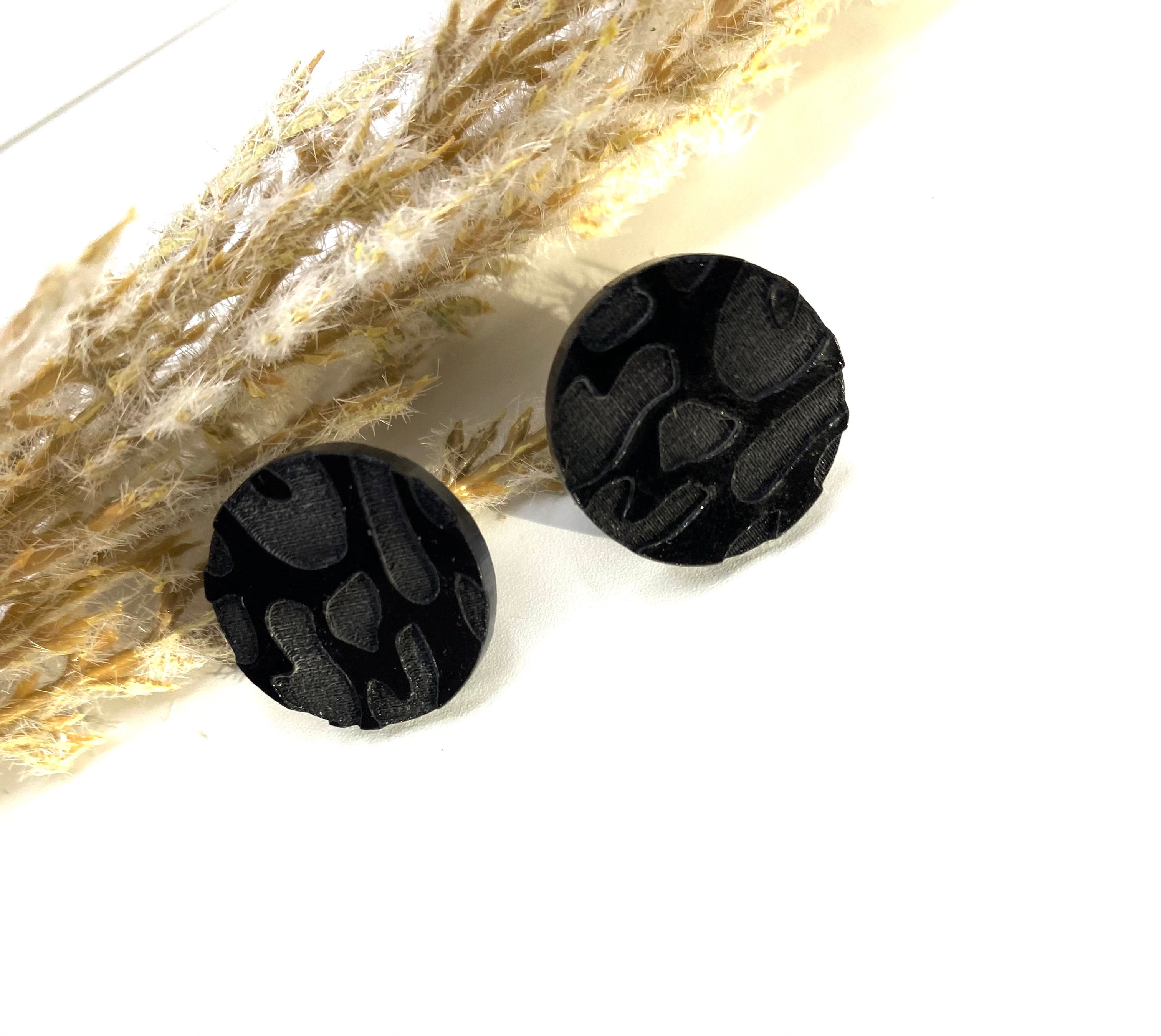 Black Leo Studs